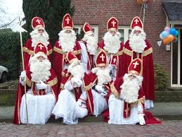Assistant Sinterklaas in purple uniform
